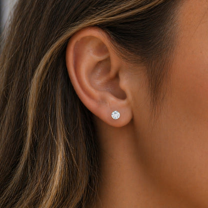 5mm 14 karat gold lab grown diamond stud earring shown worn on the ear
