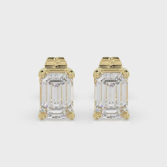 4-Prong Basket Emerald Cut Diamond Stud Earrings 1 ct, 10K Yellow Gold, video