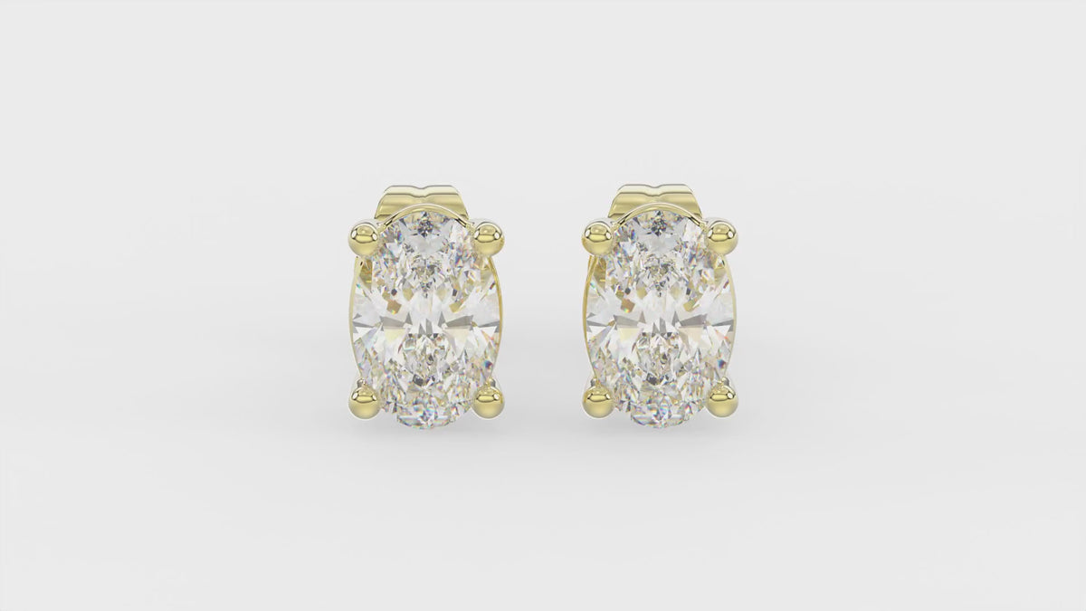 4-Prong Basket Oval Diamond Stud Earrings 1 ct, 10K Yellow Gold, video